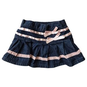 Vintage Y2K early 2000s short mini denim skirt with pink lace/bows